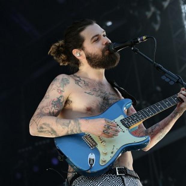 Congleton Guardian: Simon Neil of Biffy Clyro performing on the Main Stage at the Isle of Wight Festival, in Seaclose Park Congleton Guardian: Simon Neil of Biffy Clyro performing on the Main Stage at the Isle of Wight Festival, in Seaclose Park