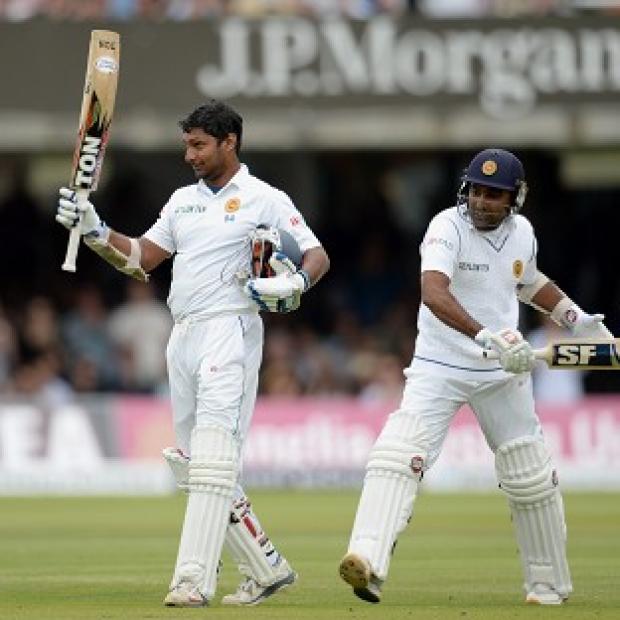 Congleton Guardian: Kumar Sangakkara, left, celebrates scoring his first century at Lord's Congleton Guardian: Kumar Sangakkara, left, celebrates scoring his first century at Lord's