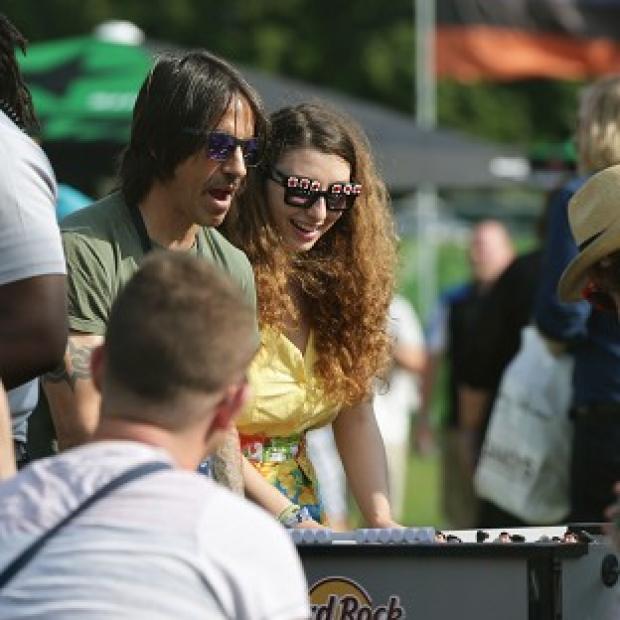 Congleton Guardian: Anthony Kiedis of the Red Hot Chili Peppers playing table football backstage at the Isle of Wight Festival Congleton Guardian: Anthony Kiedis of the Red Hot Chili Peppers playing table football backstage at the Isle of Wight Festival
