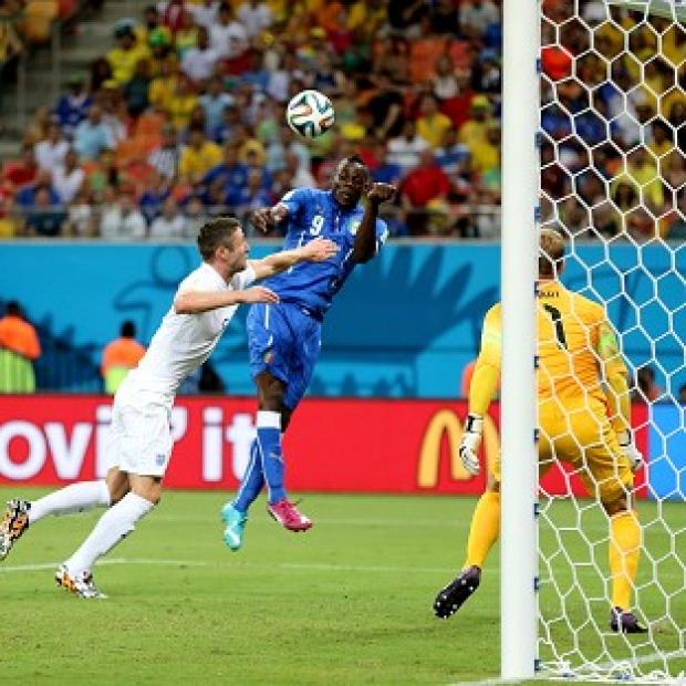 Congleton Guardian: Mario Balotelli scores Italy's second goal in their World Cup opener with England Congleton Guardian: Mario Balotelli scores Italy's second goal in their World Cup opener with England