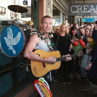 Congleton Guardian: Coldplay's Chris Martin serenades the crowd on the streets of Sydney (Rex) Congleton Guardian: Coldplay's Chris Martin serenades the crowd on the streets of Sydney (Rex)