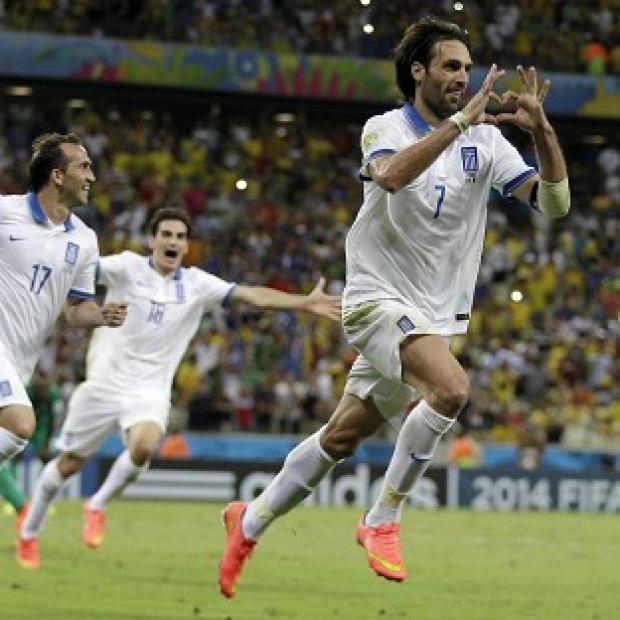 Congleton Guardian: Giorgos Samaras celebrates scoring Greece's last-gasp winner (AP) Congleton Guardian: Giorgos Samaras celebrates scoring Greece's last-gasp winner (AP)