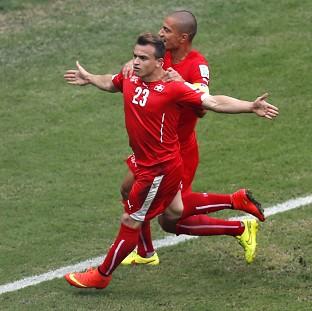 Congleton Guardian: Switzerland's Xherdan Shaqiri celebrates opening the scoring (AP) Congleton Guardian: Switzerland's Xherdan Shaqiri celebrates opening the scoring (AP)