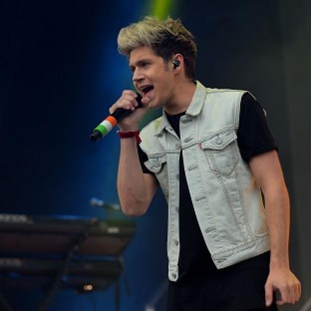 Congleton Guardian: Niall Horan of One Direction asked fans to be careful what they throw on stage Congleton Guardian: Niall Horan of One Direction asked fans to be careful what they throw on stage