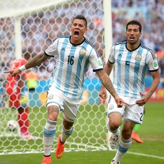 Congleton Guardian: Marcos Rojo, left, scored in Argentina's win over Nigeria Congleton Guardian: Marcos Rojo, left, scored in Argentina's win over Nigeria