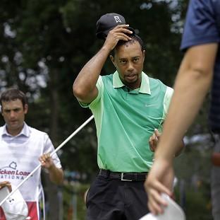 Congleton Guardian: Tiger Woods showed signs of rustiness on his return to action after back surgery (AP) Congleton Guardian: Tiger Woods showed signs of rustiness on his return to action after back surgery (AP)