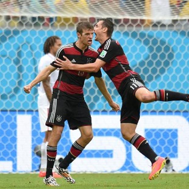 Congleton Guardian: Thomas Muller, left, was Germany's matchwinner Congleton Guardian: Thomas Muller, left, was Germany's matchwinner