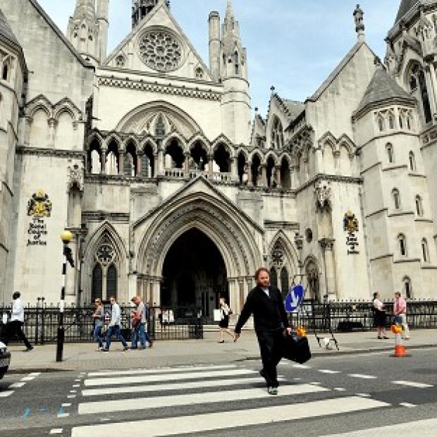 Congleton Guardian: The couple became embroiled in a transcontinental tug-of-love over their baby daughter, a High Court judge heard Congleton Guardian: The couple became embroiled in a transcontinental tug-of-love over their baby daughter, a High Court judge heard