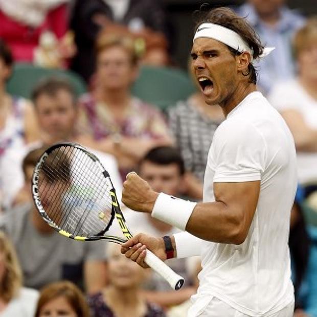Congleton Guardian: Rafael Nadal, pictured, defeated Mikhail Kukushkin 6-7 (4/7) 6-1 6-1 6-1 under the Centre Court roof Congleton Guardian: Rafael Nadal, pictured, defeated Mikhail Kukushkin 6-7 (4/7) 6-1 6-1 6-1 under the Centre Court roof