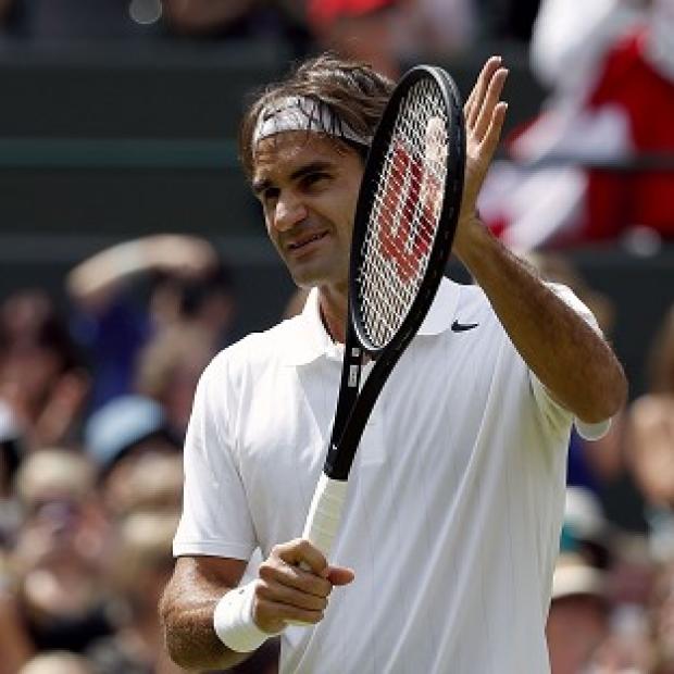 Congleton Guardian: Roger Federer, pictured, reached his 12th Wimbledon quarter-final with a straight-sets victory over Tommy Robredo Congleton Guardian: Roger Federer, pictured, reached his 12th Wimbledon quarter-final with a straight-sets victory over Tommy Robredo
