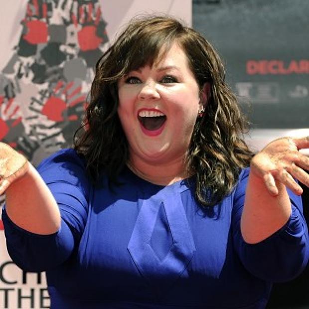 Congleton Guardian: Melissa McCarthy shows off her hands after putting them in cement during a ceremony in Hollywood Congleton Guardian: Melissa McCarthy shows off her hands after putting them in cement during a ceremony in Hollywood