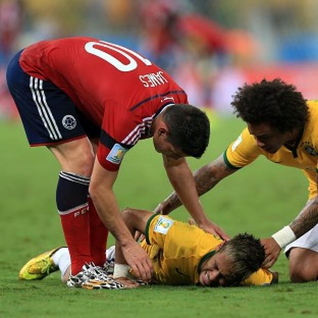 Congleton Guardian: James Rodriguez, left, and Marcelo show concern for Neymar after the injury which ended his World Cup Congleton Guardian: James Rodriguez, left, and Marcelo show concern for Neymar after the injury which ended his World Cup