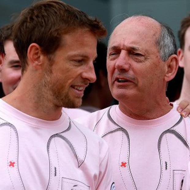 Congleton Guardian: Jenson Button, pictured here with Ron Dennis, finished fourth at Silverstone Congleton Guardian: Jenson Button, pictured here with Ron Dennis, finished fourth at Silverstone
