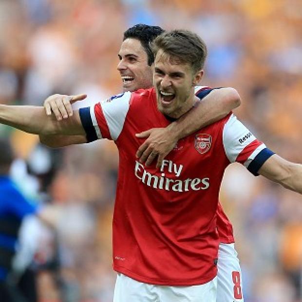 Congleton Guardian: Aaron Ramsey hopes to be celebrating more success in 2014/15 Congleton Guardian: Aaron Ramsey hopes to be celebrating more success in 2014/15