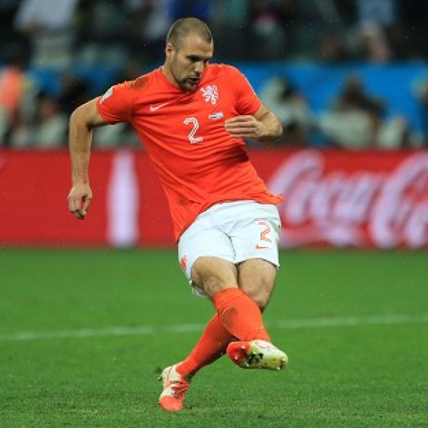 Congleton Guardian: Ron Vlaar is moving on from his missed penalty against Argentina, pictured here Congleton Guardian: Ron Vlaar is moving on from his missed penalty against Argentina, pictured here