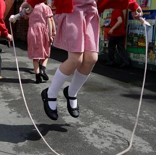 Congleton Guardian: Children at St. George's C of E Primary School in Stockport, skip and play hop scotch during playtime. Congleton Guardian: Children at St. George's C of E Primary School in Stockport, skip and play hop scotch during playtime.