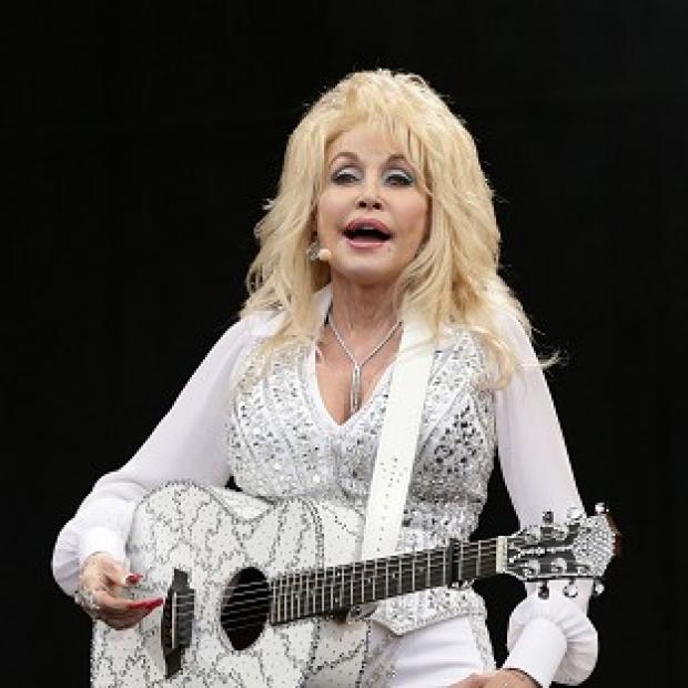 Congleton Guardian: Dolly Parton is relieved the dog left behind at Glastonbury has been claimed by its owners Congleton Guardian: Dolly Parton is relieved the dog left behind at Glastonbury has been claimed by its owners