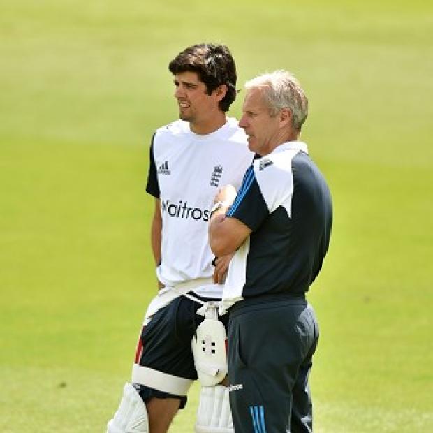 Congleton Guardian: England coach Peter Moores, right, has confidence that Alastair Cook, left, will start contributing with the bat Congleton Guardian: England coach Peter Moores, right, has confidence that Alastair Cook, left, will start contributing with the bat