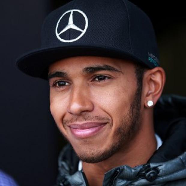 Congleton Guardian: Lewis Hamilton is all smiles again after his recent British Grand Prix victory Congleton Guardian: Lewis Hamilton is all smiles again after his recent British Grand Prix victory