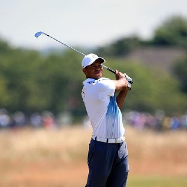 Congleton Guardian: Tiger Woods took advantage of good scoring conditions to shoot a three-under 69 on the first day of the 143rd Open Championship at Royal Liverpool Congleton Guardian: Tiger Woods took advantage of good scoring conditions to shoot a three-under 69 on the first day of the 143rd Open Championship at Royal Liverpool
