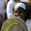 Serena Williams celebrates her Wimbledon victory over sister Venus